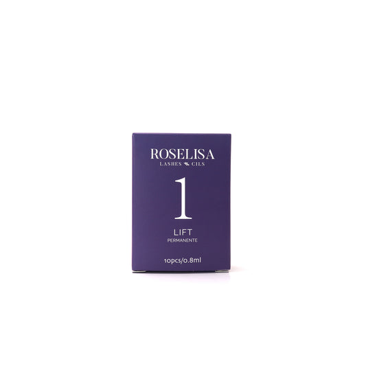 Solution #1 - LIFT de la marque Roselisa. Cette lotion est la première étape du système LIFT qui décomposera la forme des cheveux, leur permettant de prendre leur nouvelle forme.  (0.8 ml /sachet)